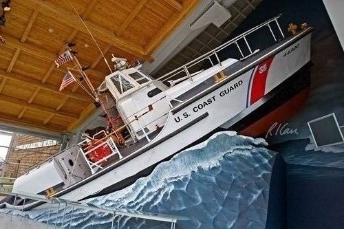 US Coast Guard cutter with flags on the mast