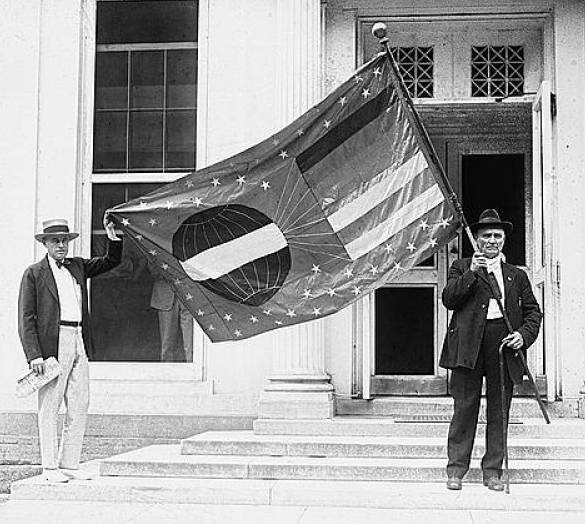 Van Kirk with world peace flag